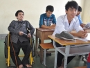 Ngồi xe lăn dự thi đại học